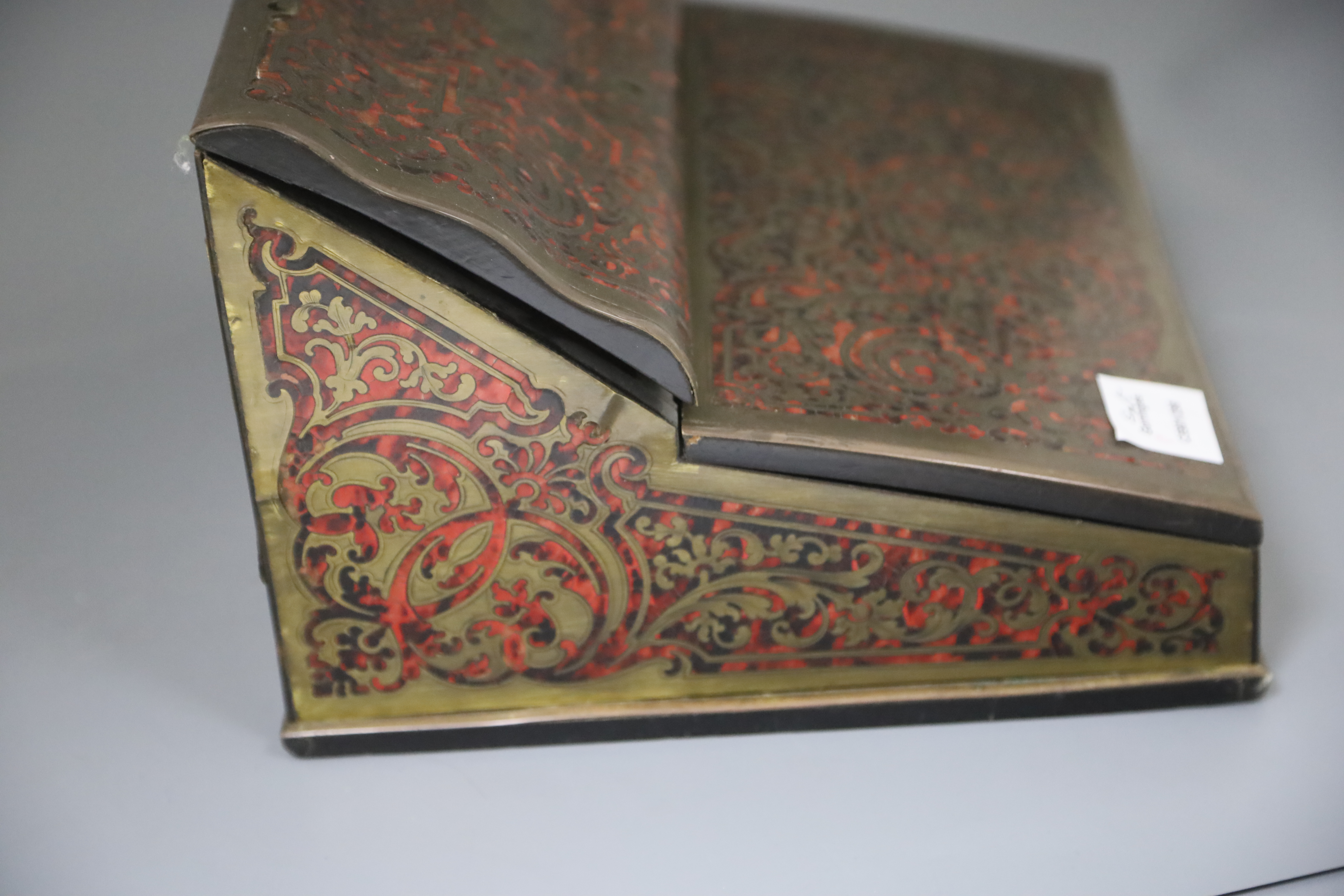 An early 20th century French red boulle work lap desk, width 13in. depth 11.5in. height 8in.